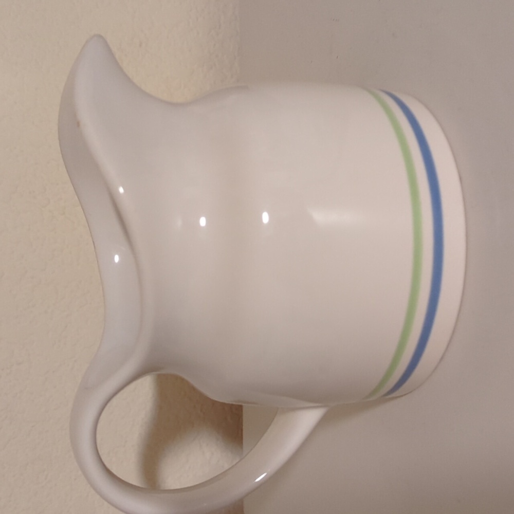 White Ceramic Pitcher with Green and Blue Stripes